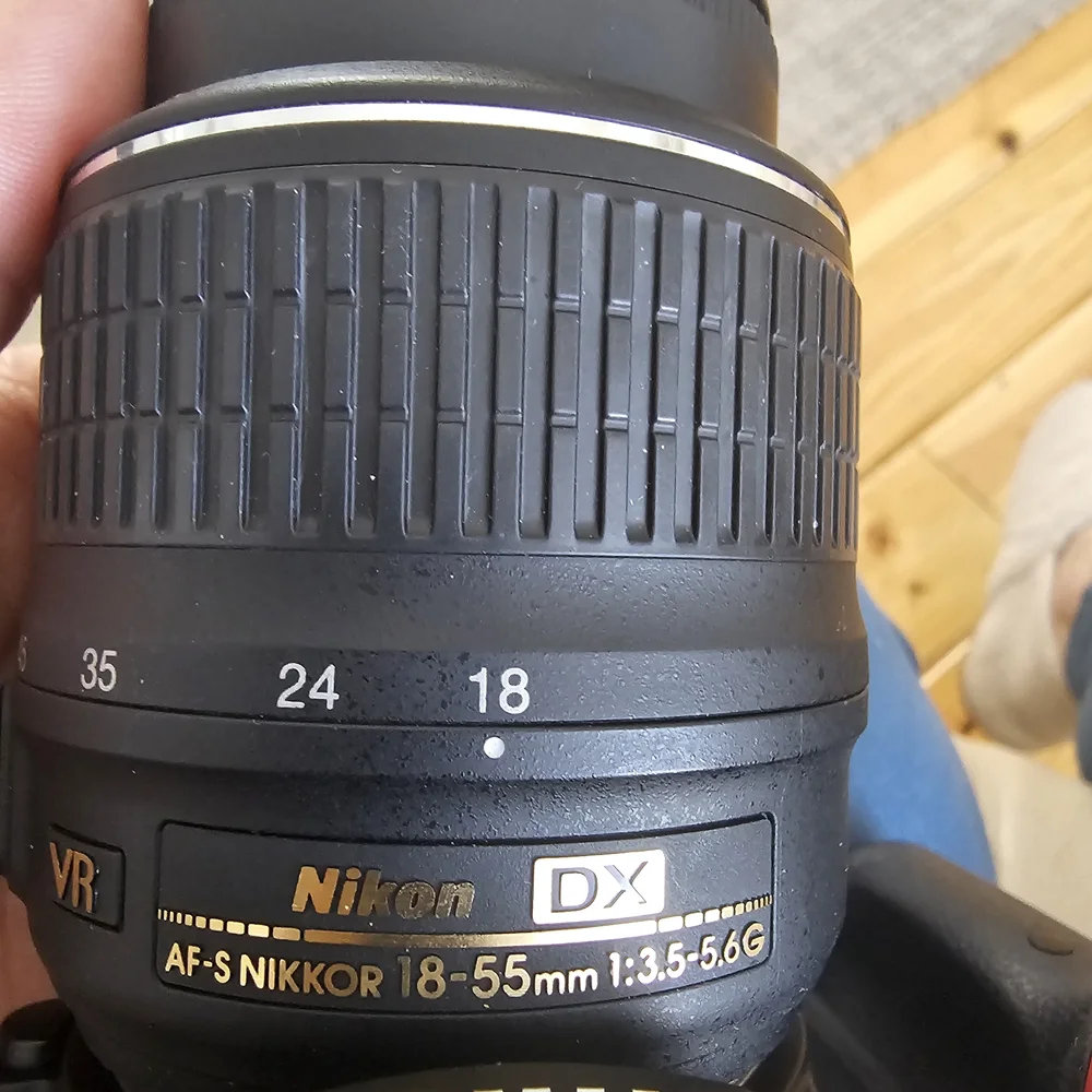 Nikon Black DSLR with Zoom Lens